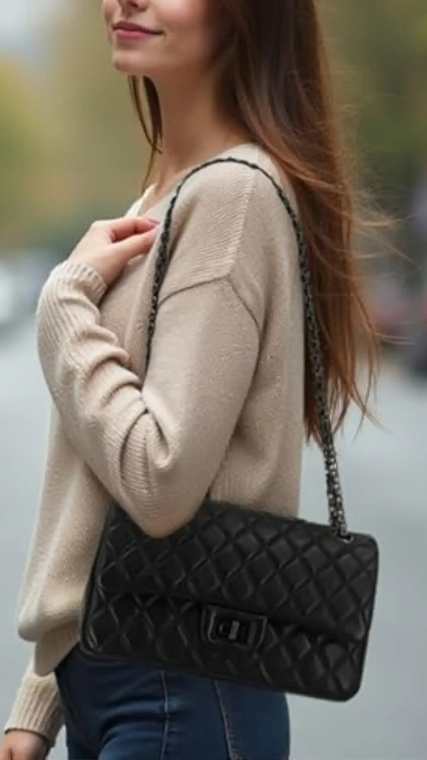 This quilted black leather crossbody bag features a structured rectangular silhouette with a soft lambskin texture, showcasing a classic diamond pattern. Accented with an adjustable double chain strap, it exudes a chic and timeless vibe, making it suitable for both casual outings and formal events.