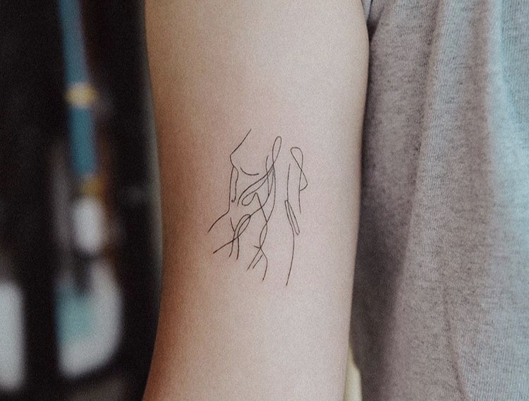 Feminine female shape minimalist tattoo concept
