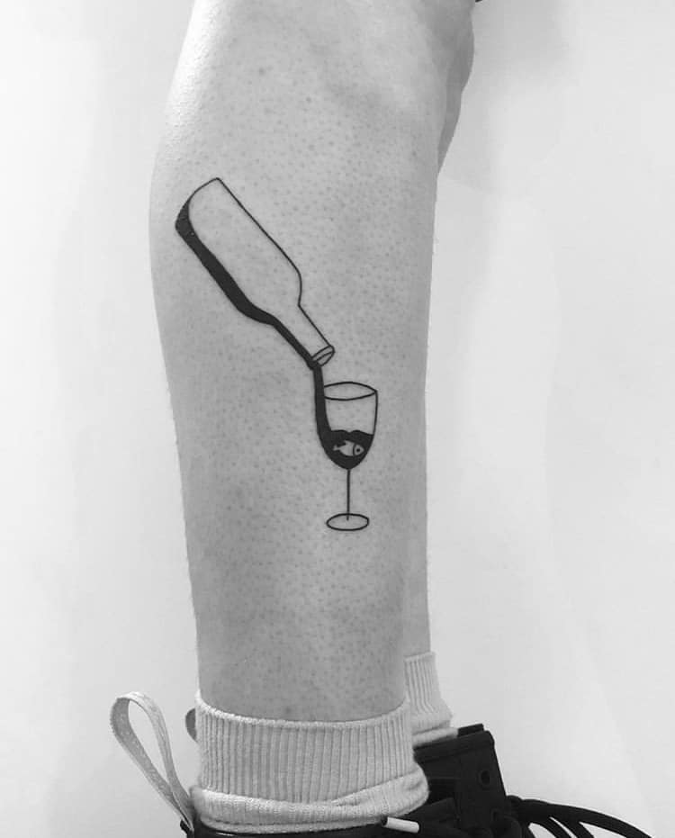 Wine glass and bottle minimalist tattoo idea