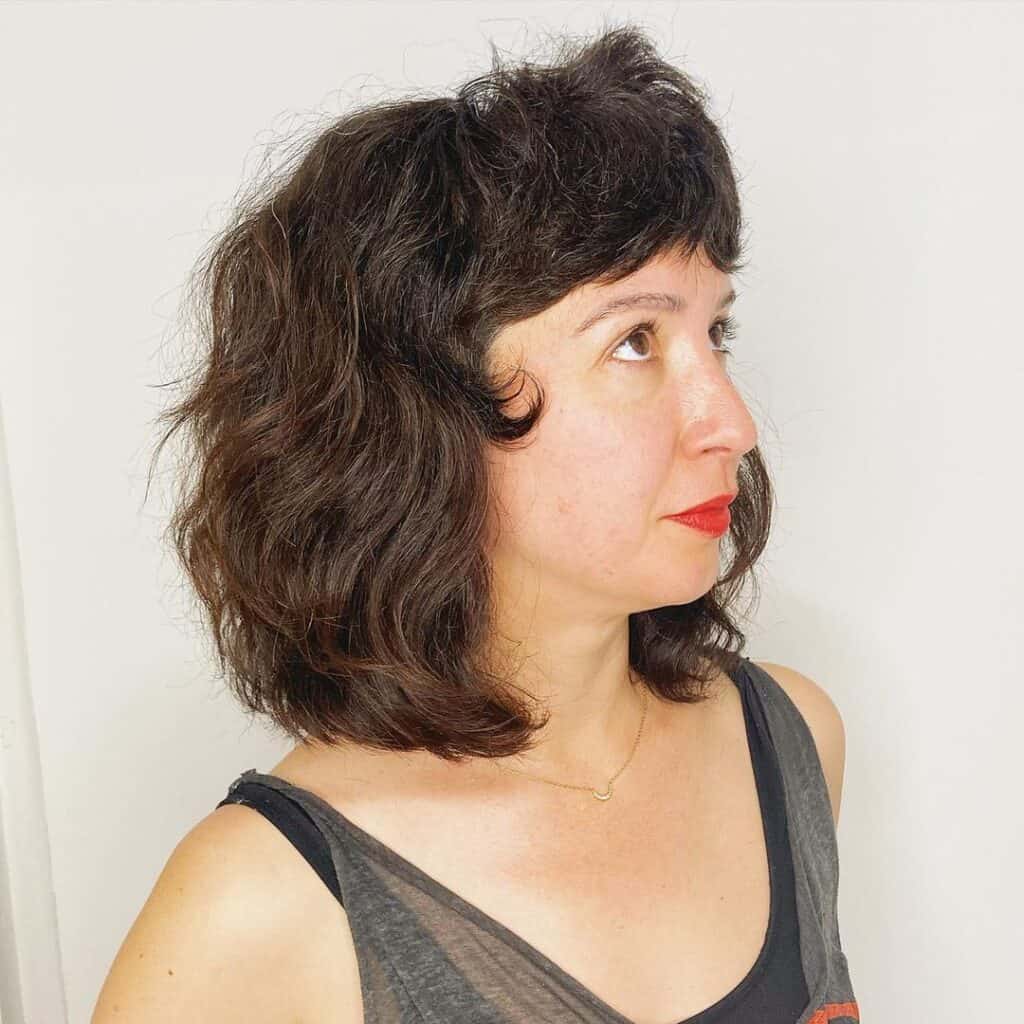 neck length bob with flippy bangs 