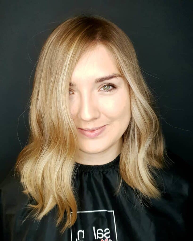 blonde bob in a side part