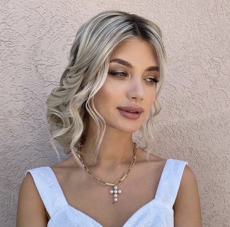 Textured mid-part hairstyle