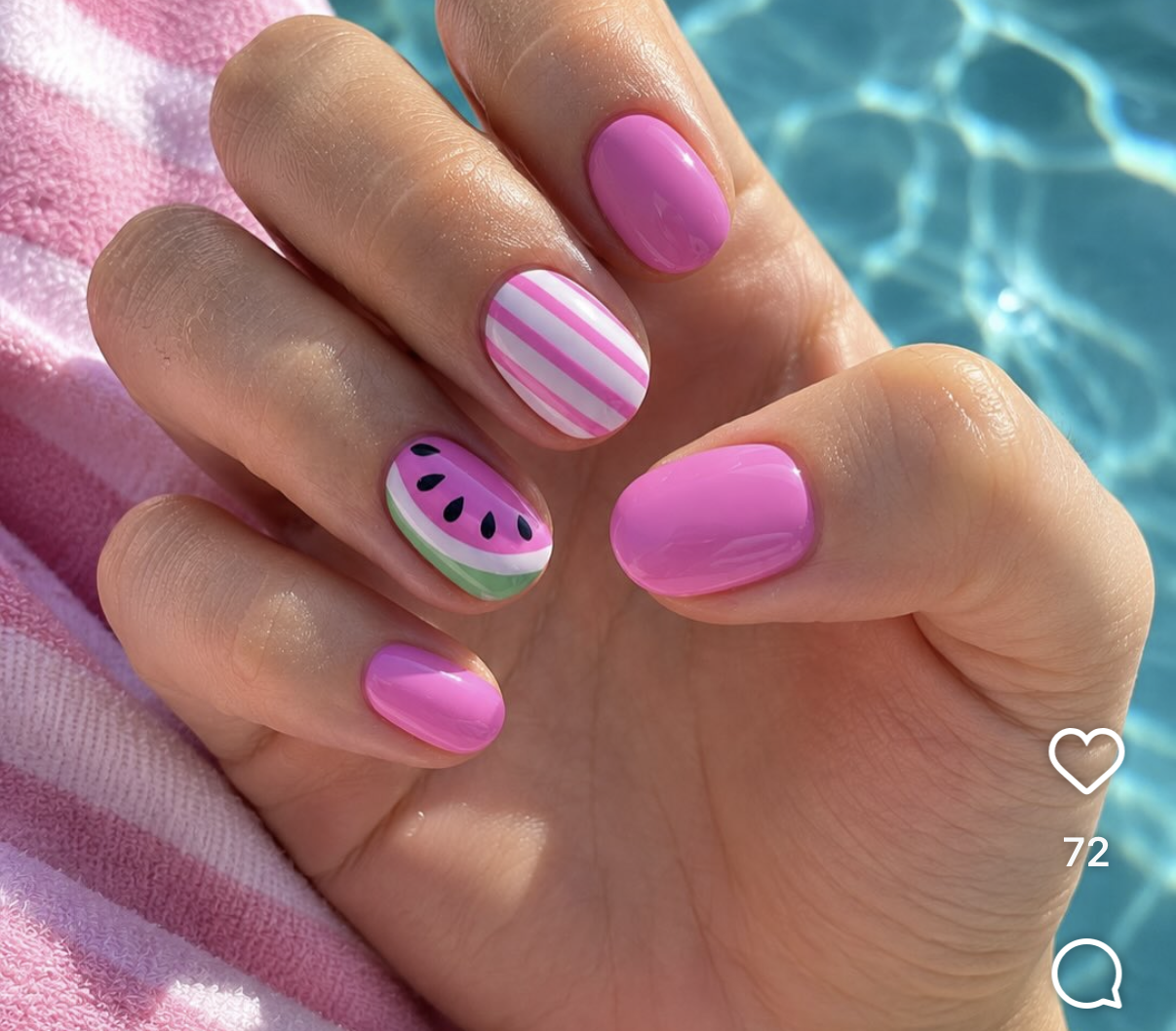 A hand reveals watermelon-themed nail art, with pink and white striped, solid pink, and watermelon slice designs.